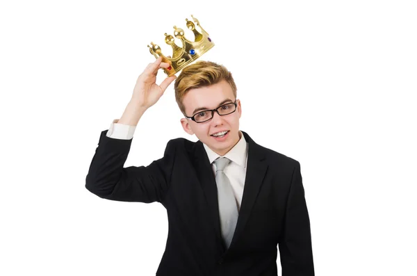 Молодой бизнесмен с короной изолирован на белом — стоковое фото