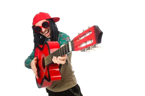 Mann mit Gitarre im musikalischen Konzept auf weiß — Stockfoto