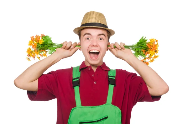 Young gardener with flower isolated on white — Stock Photo, Image