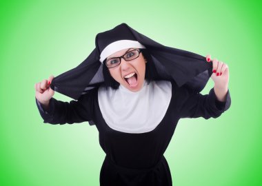 Funny nun isolated on the green