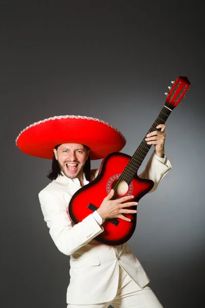 Young mexican guitar player wearing sombrero — Stock Photo, Image