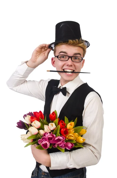 Gentiluomo sorridente con fiori isolati su bianco — Foto Stock