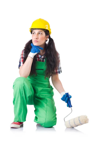 Trabalhadora feminina em macacão verde isolado em branco — Fotografia de Stock