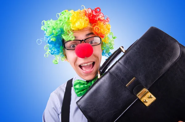 Clown zakenman geïsoleerd op blauw — Stockfoto
