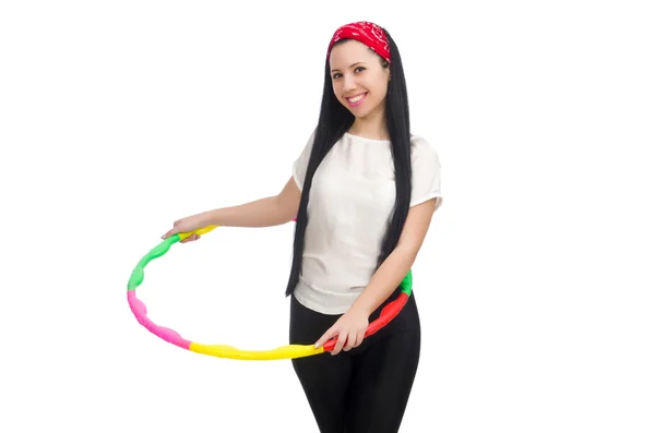 A girl in sport suit with hula hoop isolated on white — Stock Photo, Image