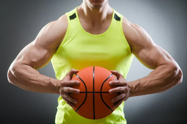 Muskelbasketball i sport koncept - Stock-foto
