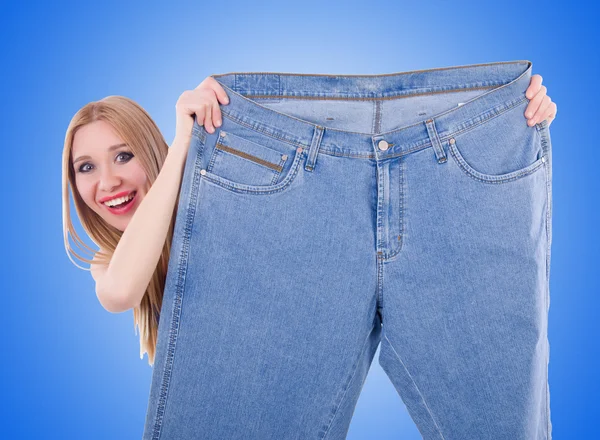 Dieetconcept met oversized jeans — Stockfoto