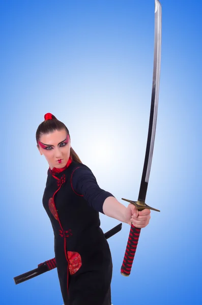 Vrouw in japans martial art concept — Stockfoto