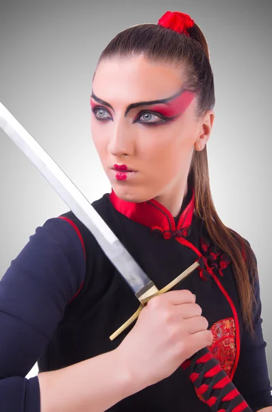 Vrouw in japans martial art concept — Stockfoto