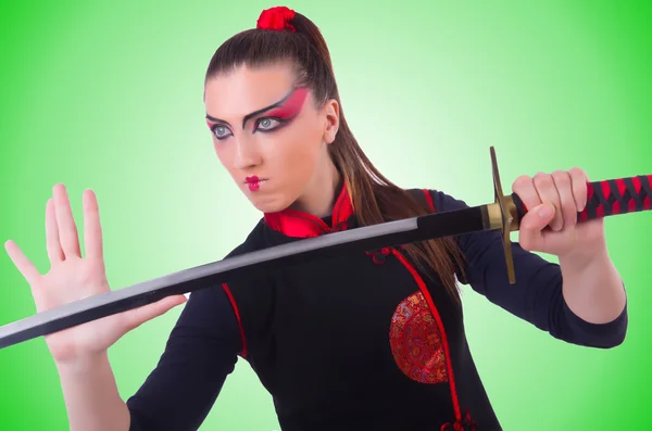 Vrouw in japans martial art concept — Stockfoto