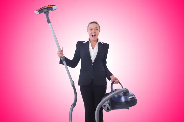 Businesswoman with vacuum cleaner — Stock Photo, Image