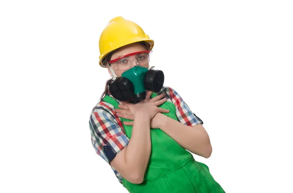 Kvinnlig arbetare bär overall och gasmask isolerad på vit — Stockfoto