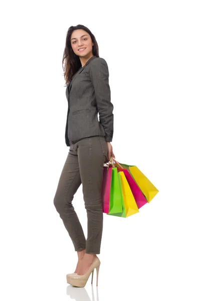 Mujer atractiva con bolsas aisladas en blanco — Foto de Stock