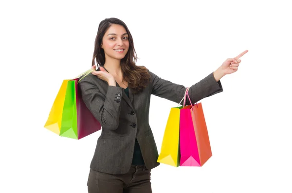 Atraktivní žena s nákupními taškami izolované na bílém — Stock fotografie
