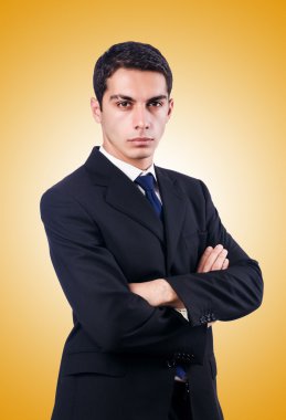 Yakışıklı işadamı sarı izole
