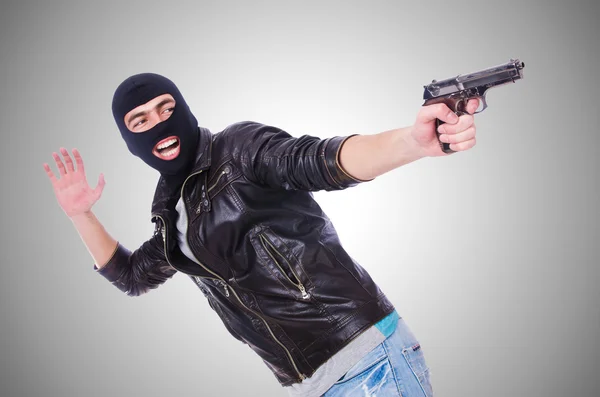 Young thug with gun — Stock Photo, Image