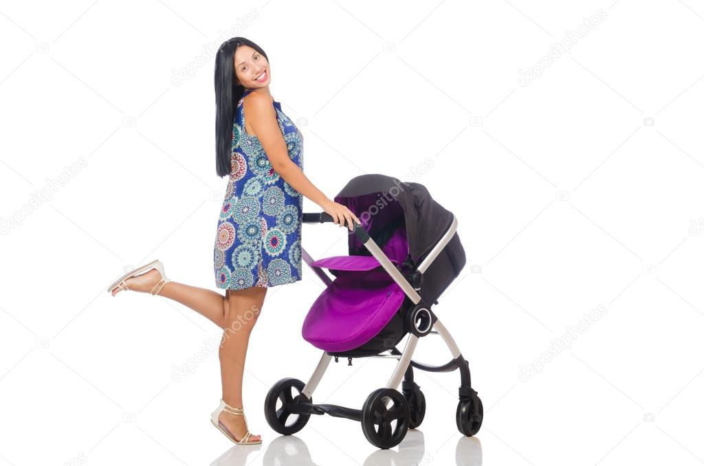 Happy mom with her baby in pram