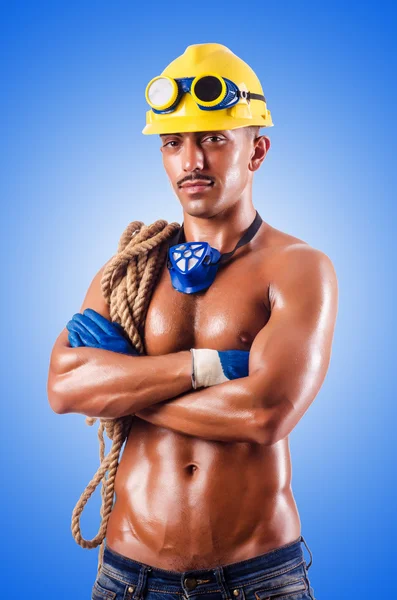 Muscular builder with tools i — Stock Photo, Image