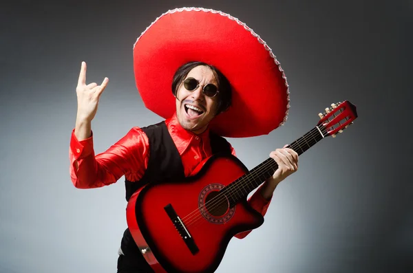 Mexican guitar player in red — Stock Photo, Image