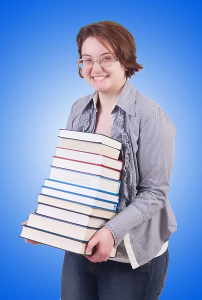 Studente ragazza con libri su bianco — Foto Stock