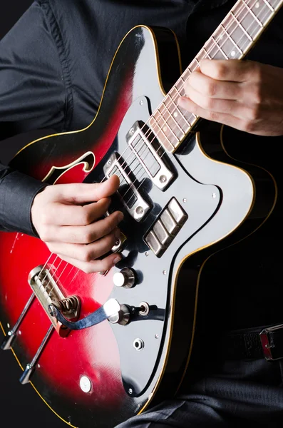 Man with guitar during concert — Stock Photo, Image