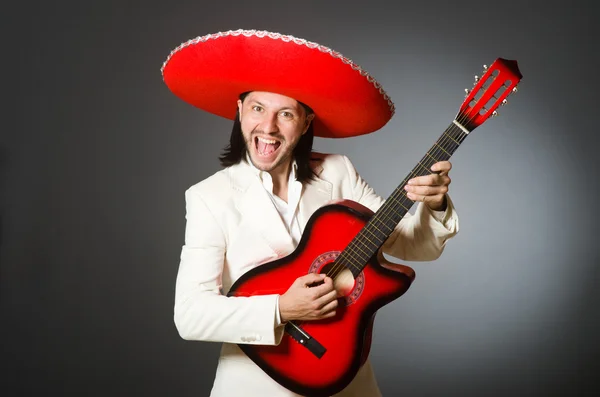 Young mexican guitar player wearing sombrero — Stock Photo, Image
