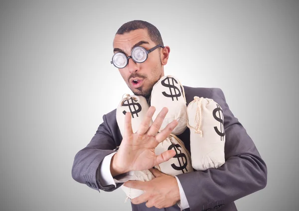 Muž s peníze pytle — Stock fotografie