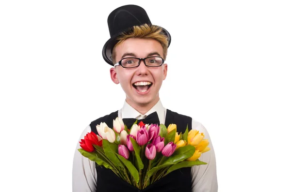 Glimlachende heer met bloemen geïsoleerd op wit — Stockfoto