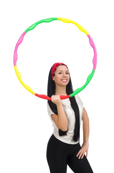 Una ragazza in tuta sportiva con hula hoop isolato su bianco — Foto Stock