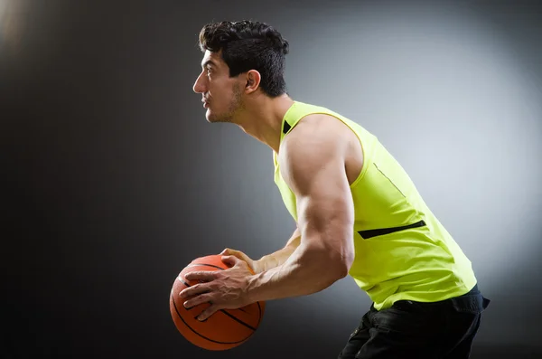 Basket-ball musculaire dans le sport concept — Photo