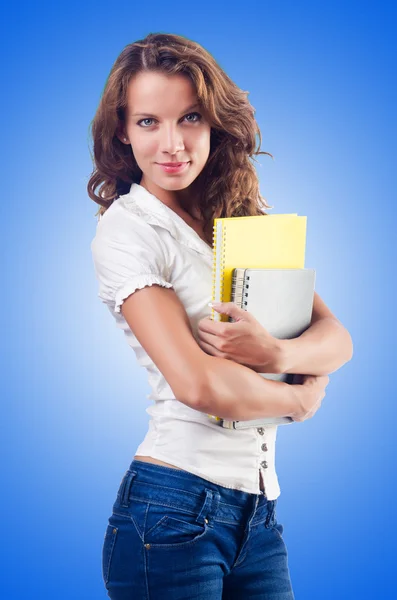 Giovane studente isolato sul blu — Foto Stock