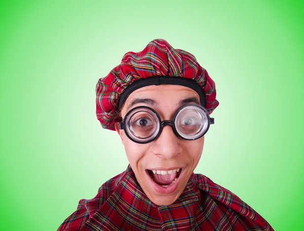 Funny scotsman isolated on the green — Stock Photo, Image