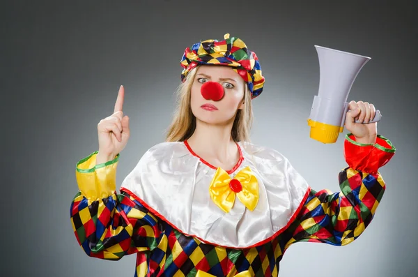 Clown with loudspeaker isolated on white — Stock Photo, Image