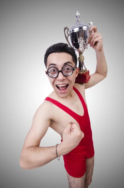 Funny wrestler with winners cup — Stock Photo, Image