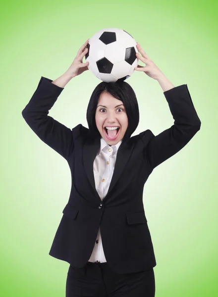 Mujer de negocios con pelota en verde —  Fotos de Stock