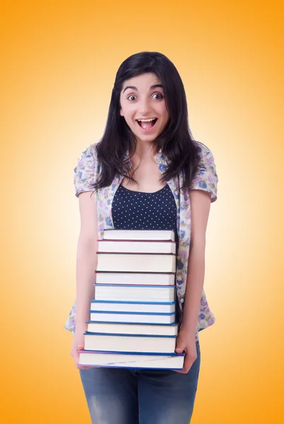 Chica estudiante con libros en blanco —  Fotos de Stock