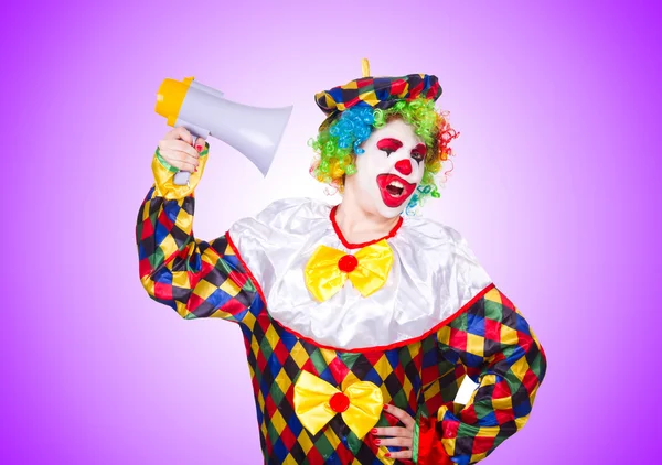 Clown mit Lautsprecher auf weiß — Stockfoto