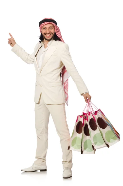 Hombre árabe con bolsas de compras en blanco — Foto de Stock