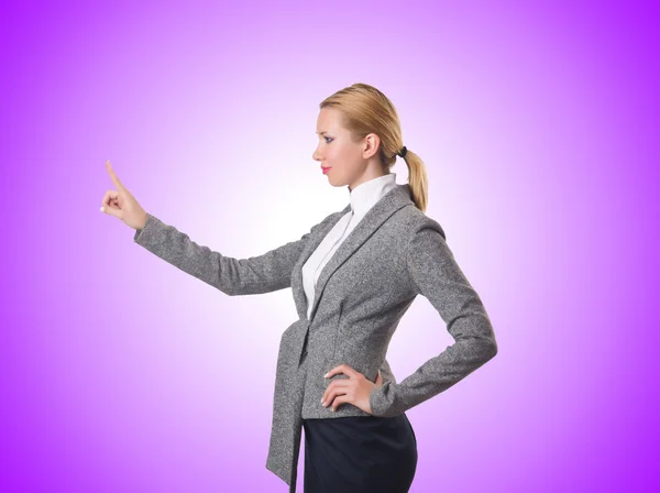 Businesswoman pressing virtual buttons — Stock Photo, Image