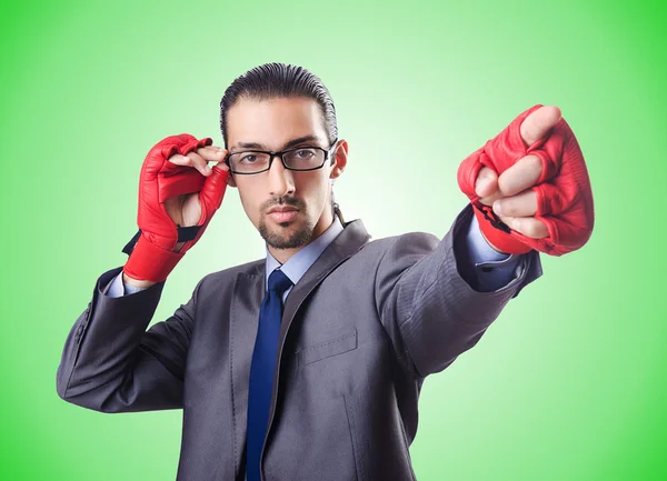 Empresário engraçado com luvas de boxe — Fotografia de Stock