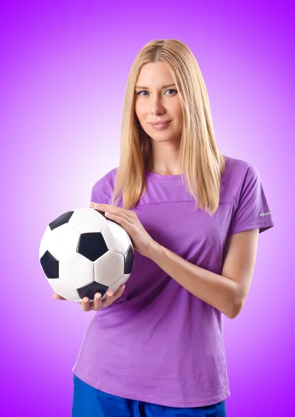 Woman playing football — Stock Photo, Image