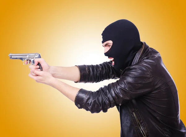 Young thug with gun — Stock Photo, Image