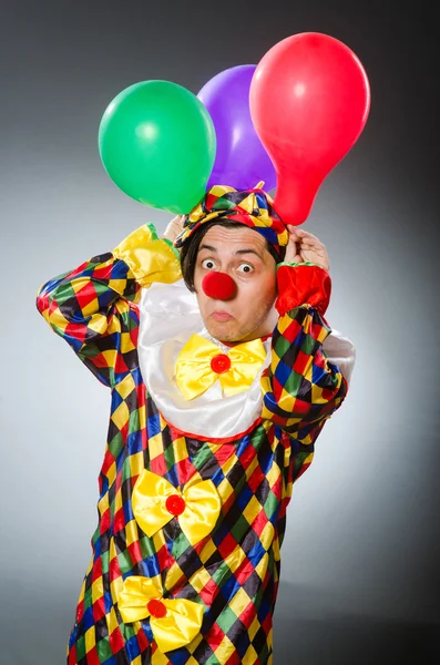 Grappige clown in komisch concept — Stockfoto