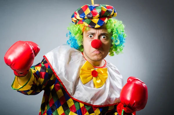 Grappige clown in komisch concept — Stockfoto