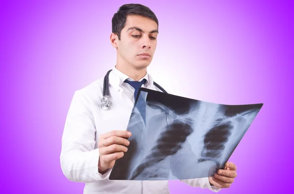 Young doctor with x-ray image — Stock Photo, Image