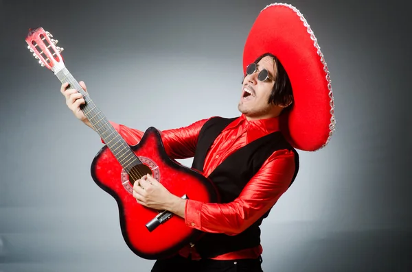 Mexican guitar player in red — Stock Photo, Image