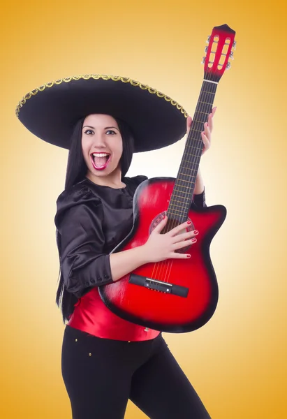 Guitar player isolated on the yellow — Stock Photo, Image