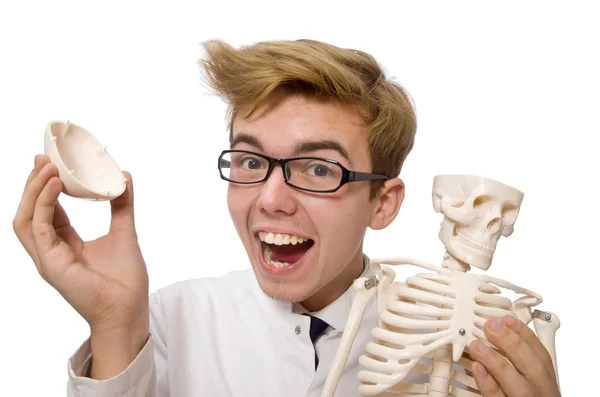 Funny doctor with skeleton isolated on white — Stock Photo, Image