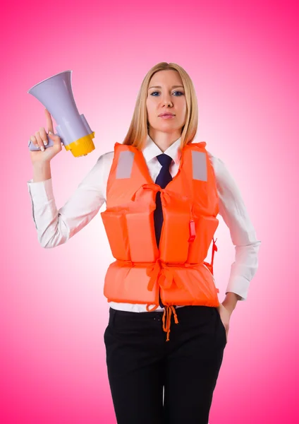 Young woman with vest and loudspeaker — Stock Photo, Image
