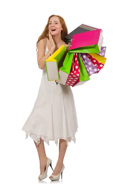 Donna con shopping bags isolata su bianco — Foto Stock